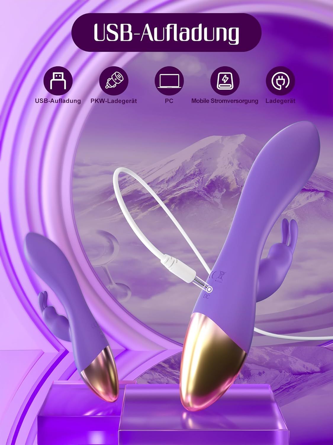 Paarse vibrator met USB-oplaadkabel en gouden accent.