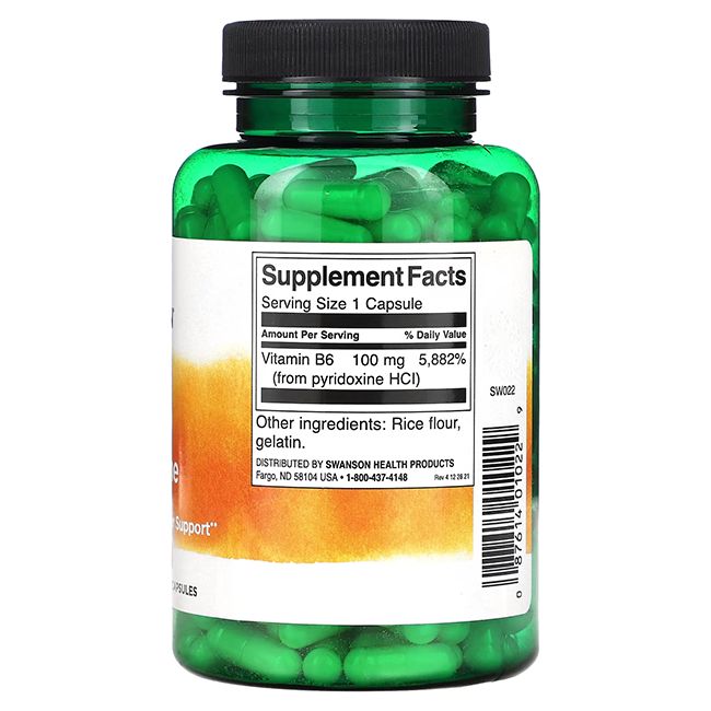 Transparante groene fles met capsules. Achterkant met wit etiket. Bevat voedingswaarde-informatie en ingrediënten.