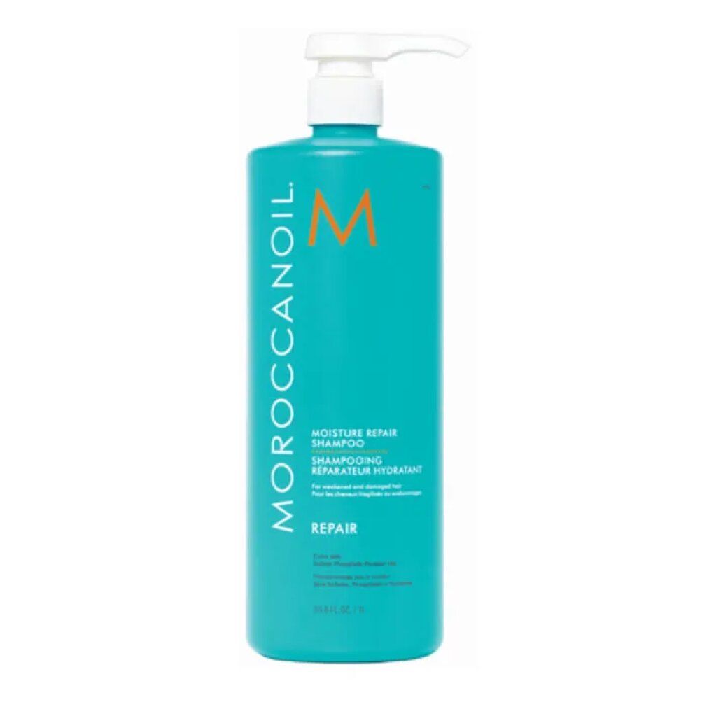 Turquoise shampoo fles met witte pomp. Opschrift: Moroccanoil, Moisture Repair Shampoo, Repair. Oranje logo.