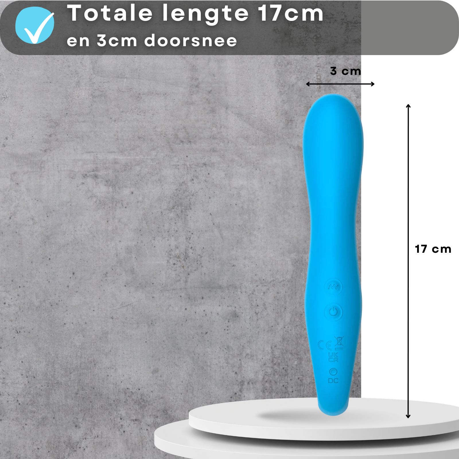 Blauwe vibrator, 17 cm lang, 3 cm diameter. Op voetstuk.