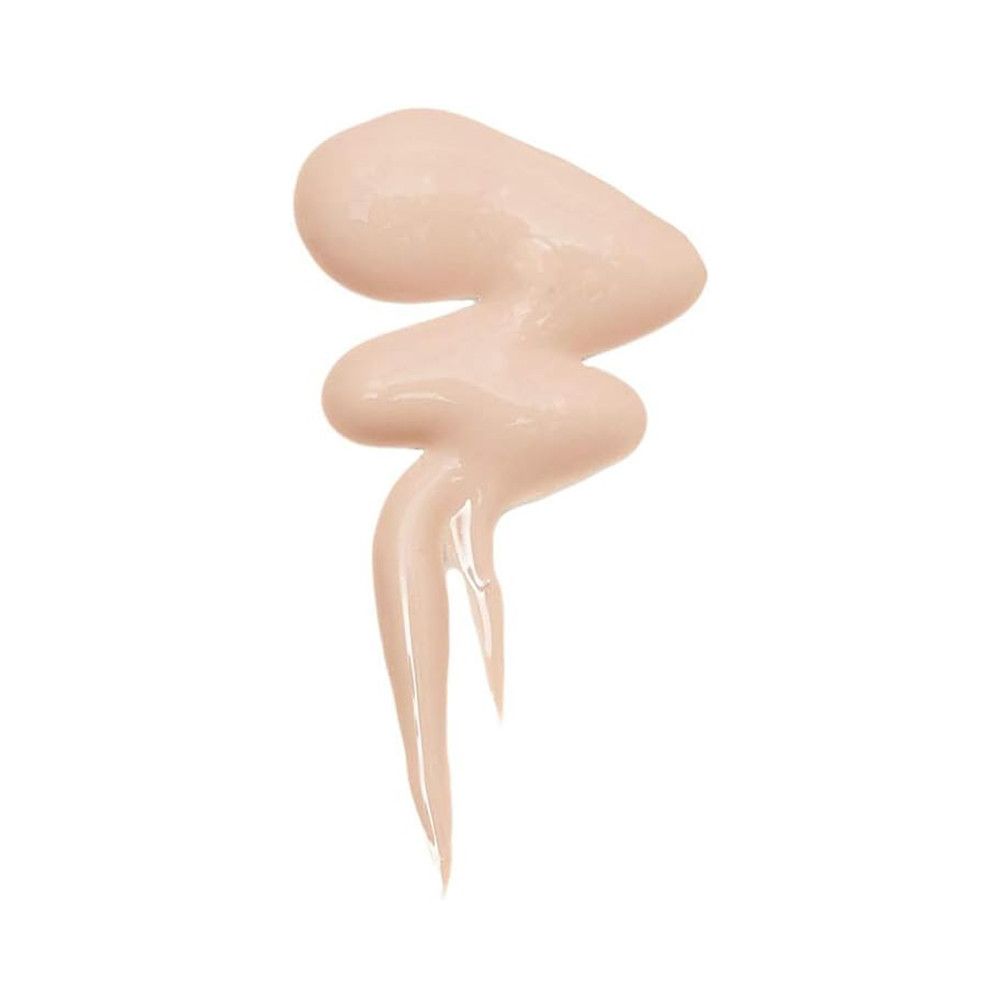 Fluide beige en forme de vague sur fond blanc. Texture visible.