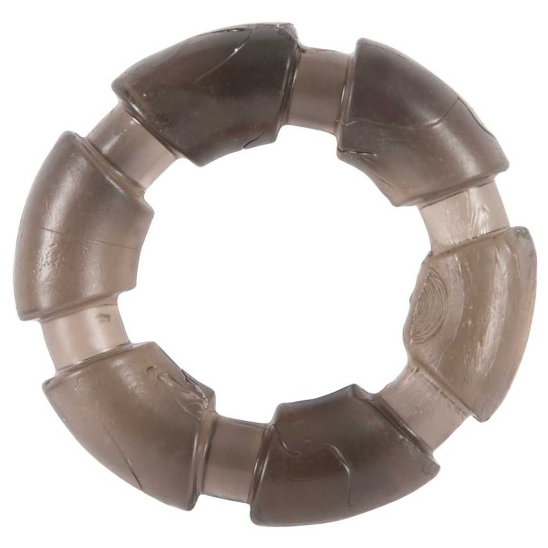 Een zwarte penisring met een gesegmenteerd ontwerp. Gemaakt van transparant materiaal.