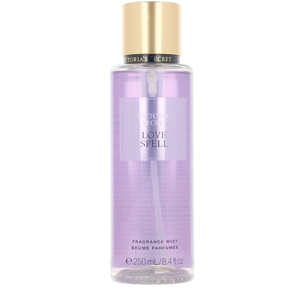 Brume corporelle Victoria's Secret Love Spell, 250 ml / 8.4 fl oz, en flacon transparent avec bouchon doré.