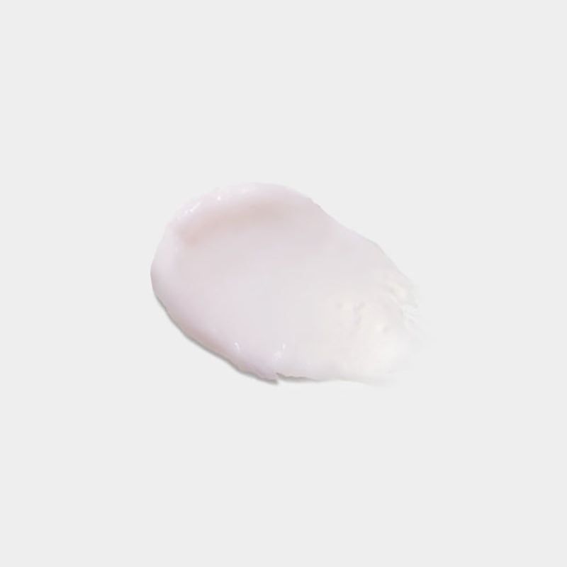 Witte balsemveeg op lichte achtergrond. Textuur zichtbaar.