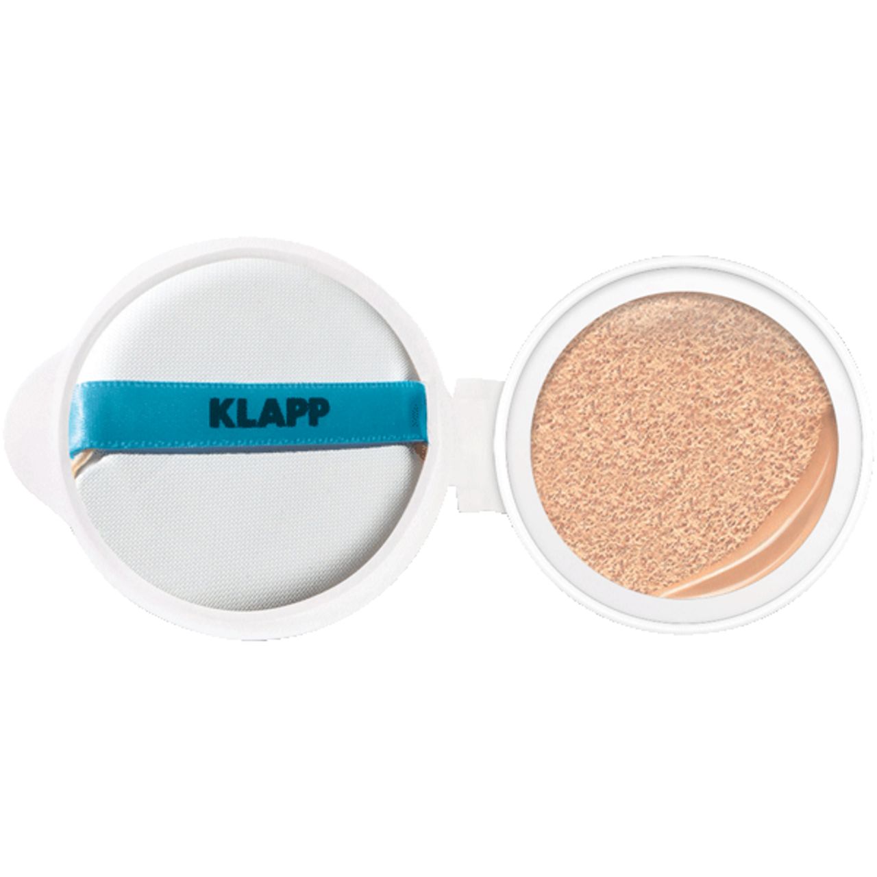 Open witte cosmeticaverpakking met spons en getint product. De spons heeft een blauwe band met de tekst KLAPP.