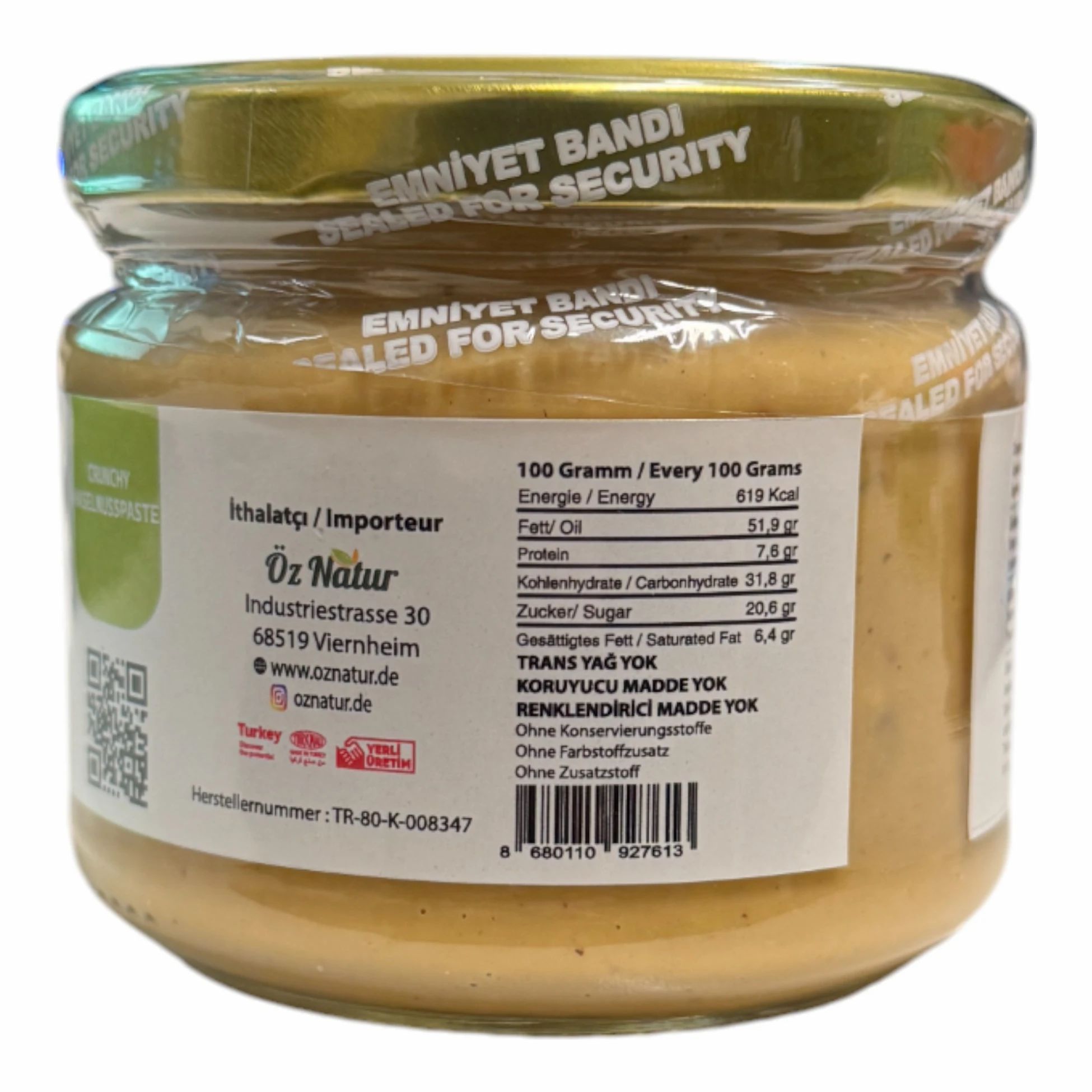 Pot de beurre de noisettes. Informations nutritionnelles, informations sur l'importateur. Sceau : Emniyet Bandi. Texte en turc et allemand.
