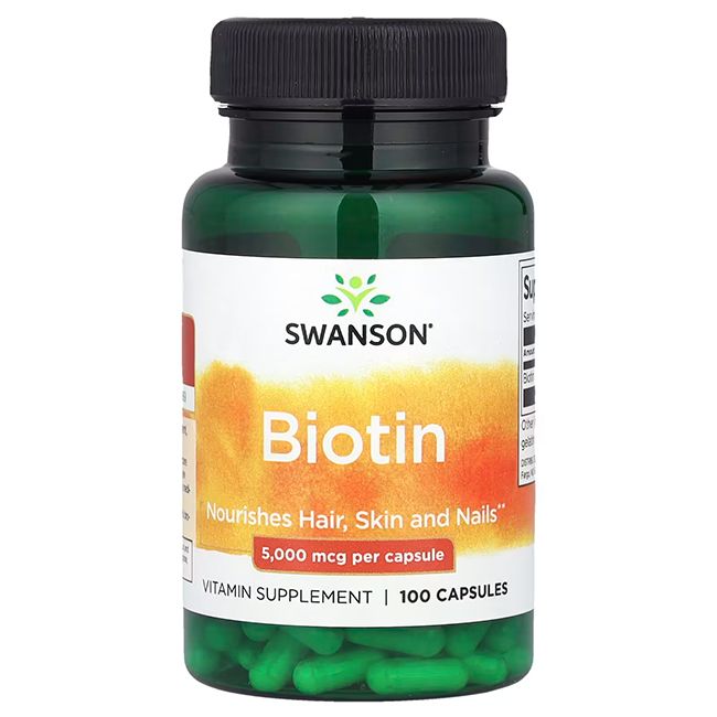 Capsules vertes dans un flacon vert. Inscription: SWANSON Biotine, 5 000 mcg par capsule. 100 capsules.