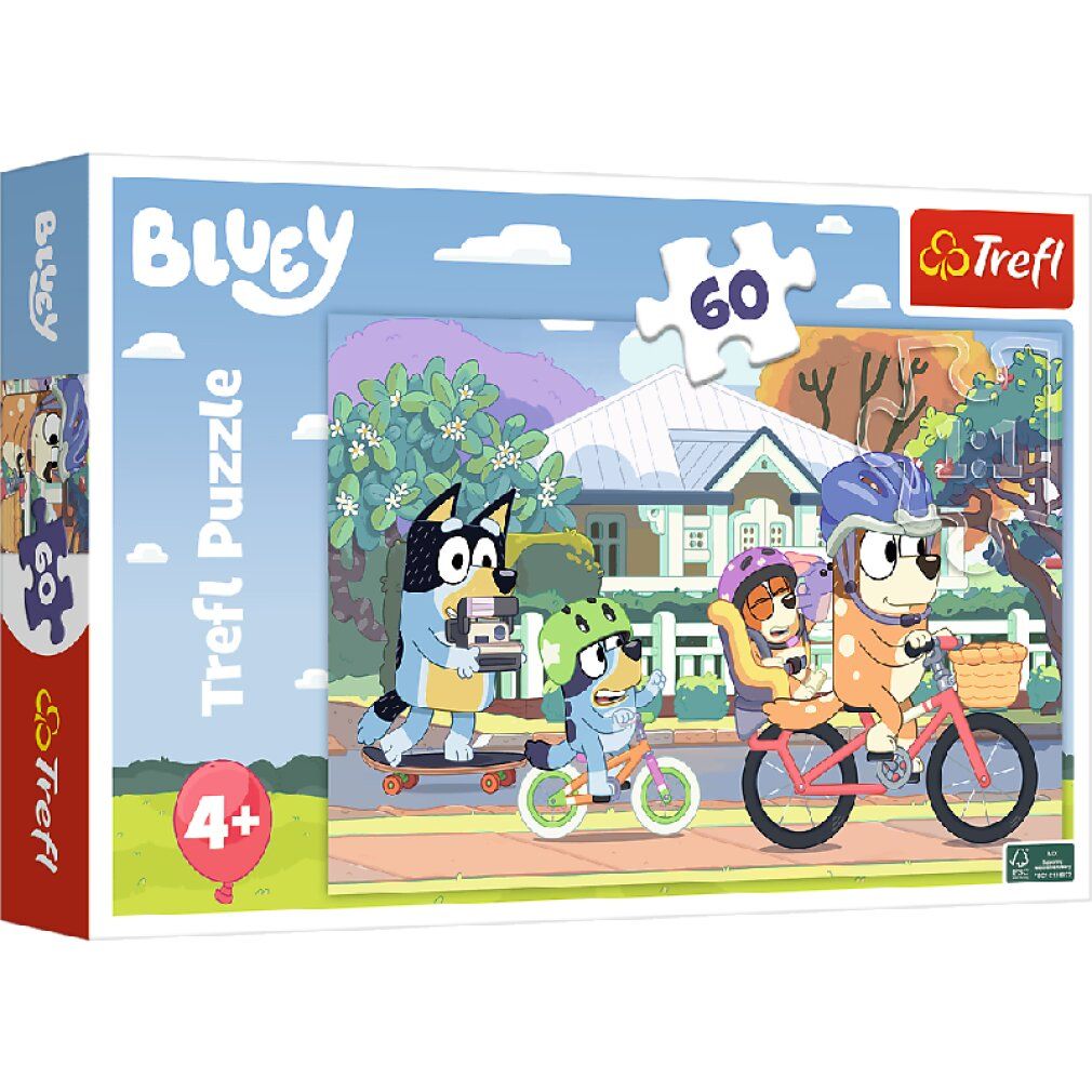 Boîte de puzzle avec illustration Bluey. Montre des personnages faisant du vélo et du skate. Contient 60 pièces, recommandé pour les 4 ans et plus.