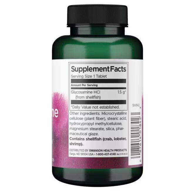 Dos de la bouteille verte. Inscription: Supplement Facts, Glucosamine HCI, 1,5 g. Contient des crustacés.