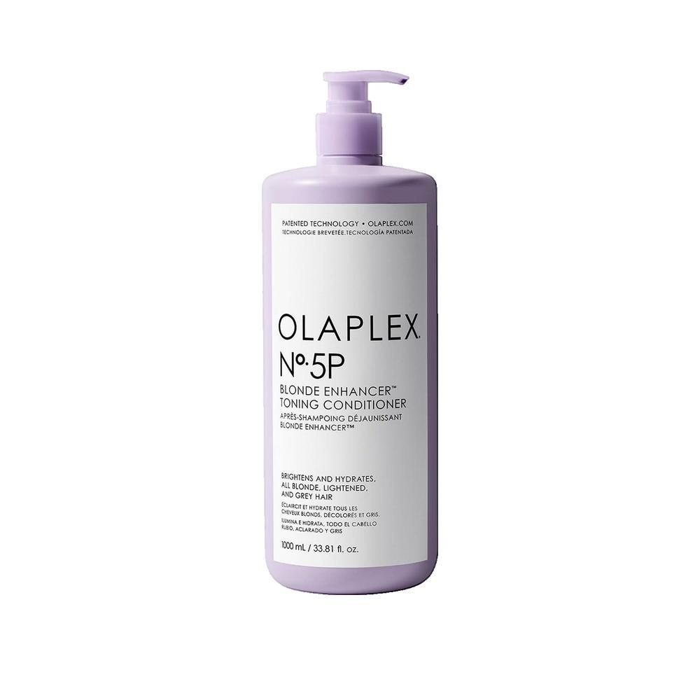 Flacon violet Olaplex N°5P avec pompe. Inscription: Blonde Enhancer Toning Conditioner. Pour cheveux blonds, décolorés et gris.
