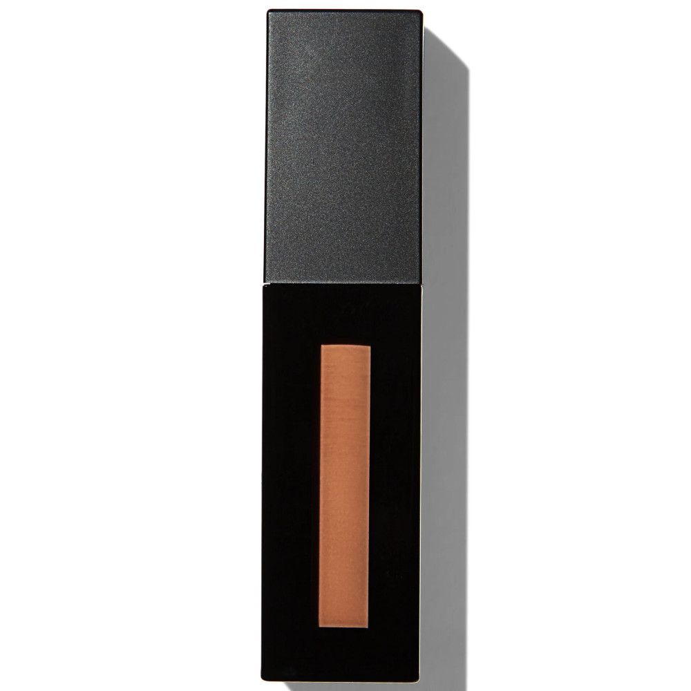 Tube de gloss noir rectangulaire fermé avec une bande orange rectangulaire au centre.