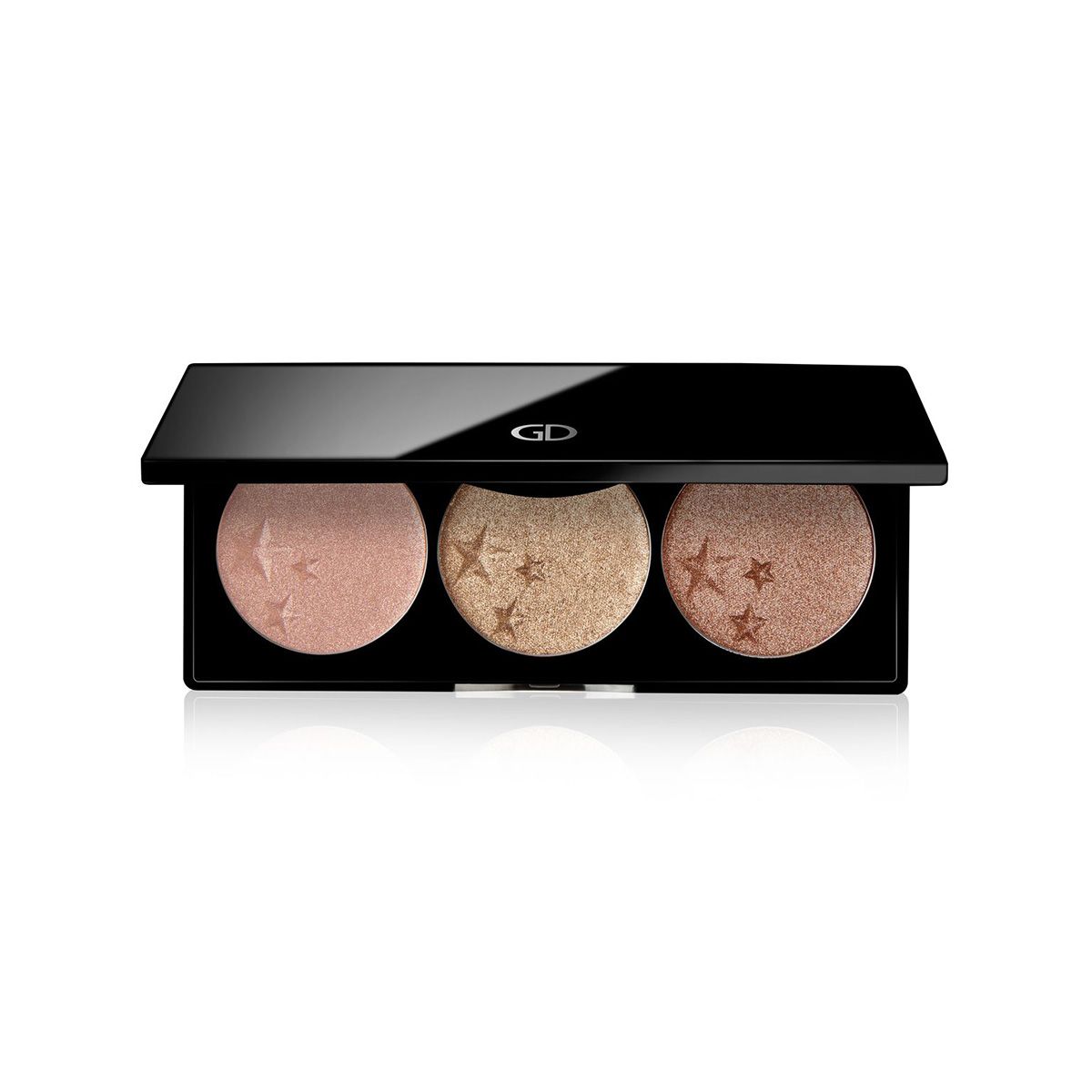 Palette de maquillage noire avec trois couleurs scintillantes rondes. Des étoiles sont imprimées. Le logo GD est visible.