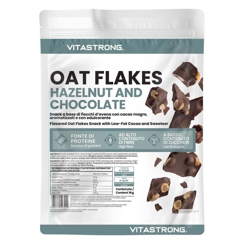 Verpakking van Vitastrong Oat Flakes met hazelnoten en chocolade. Tekst: Bron van eiwitten, hoog vezelgehalte, laag suikergehalte.