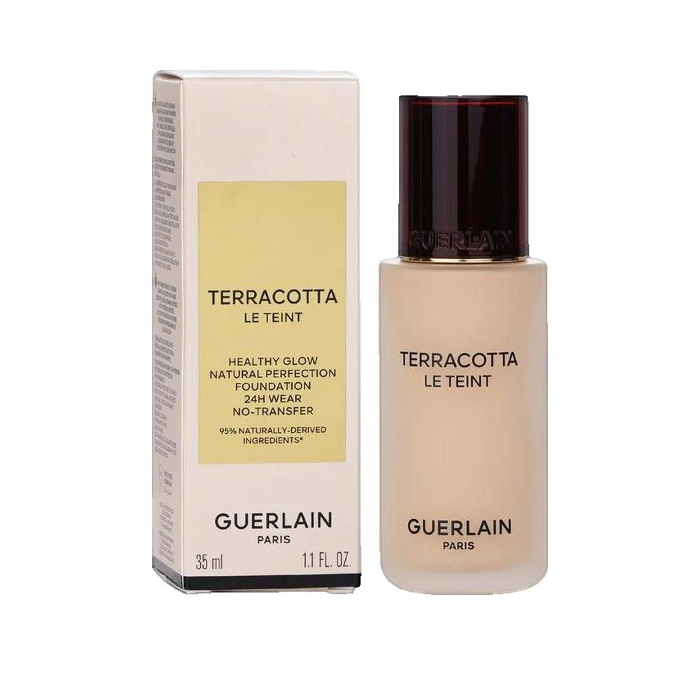 Fond de teint liquide beige et emballage. Inscription : Terracotta Le Teint, Guerlain Paris. 35 ml.