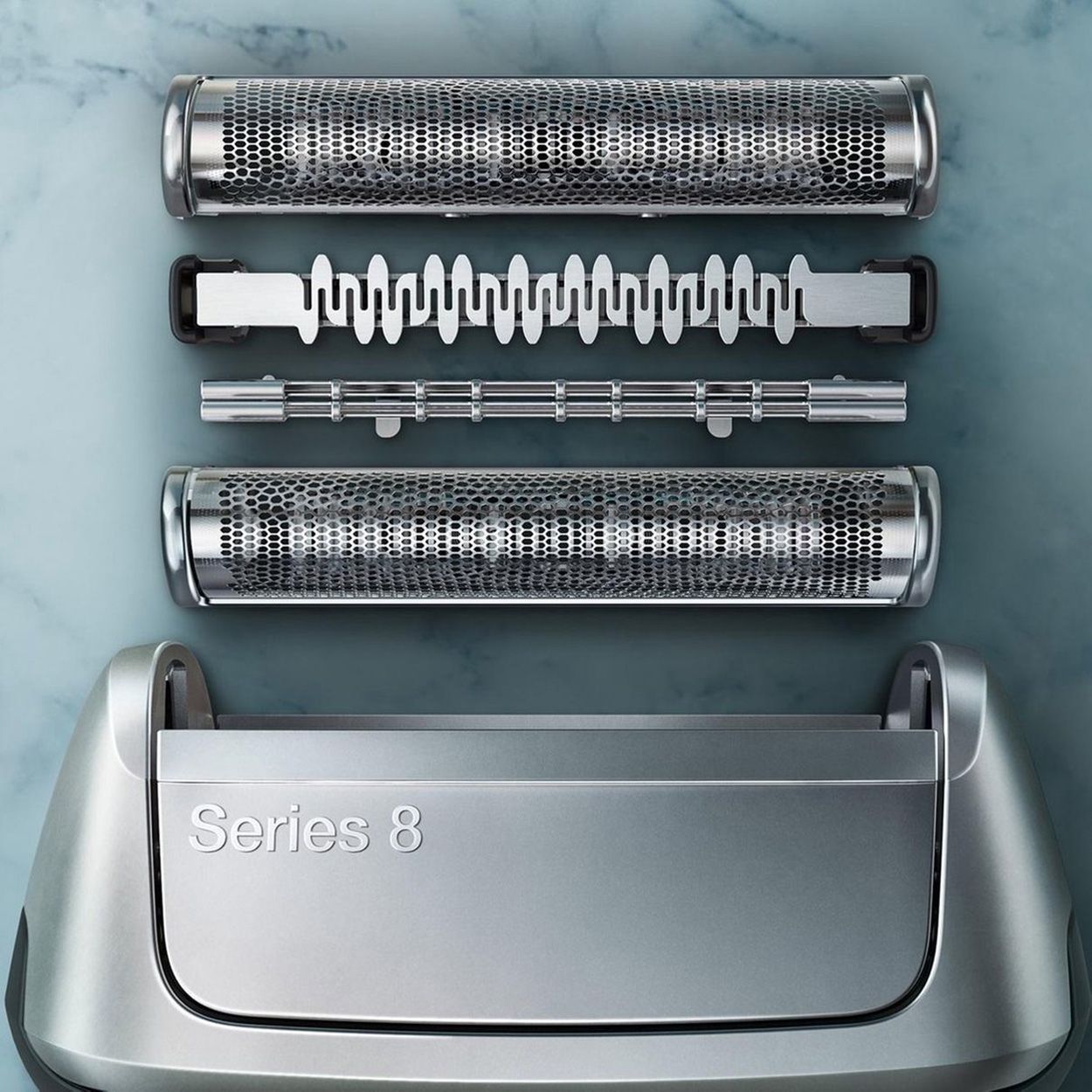 Tête de rasage démontée du rasoir électrique Braun Series 8 avec lames de précision et grilles.