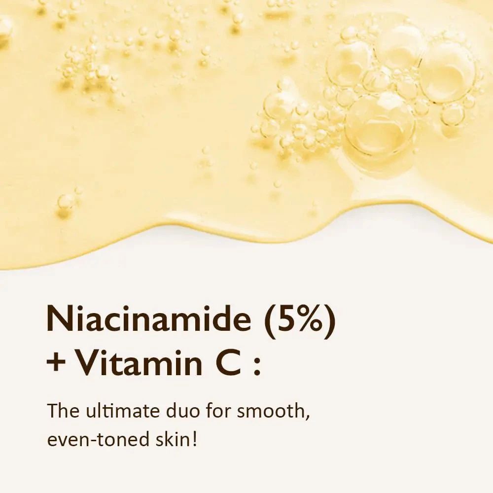Texte : Niacinamide (5%) + Vitamine C. Pour une peau lisse et uniforme.