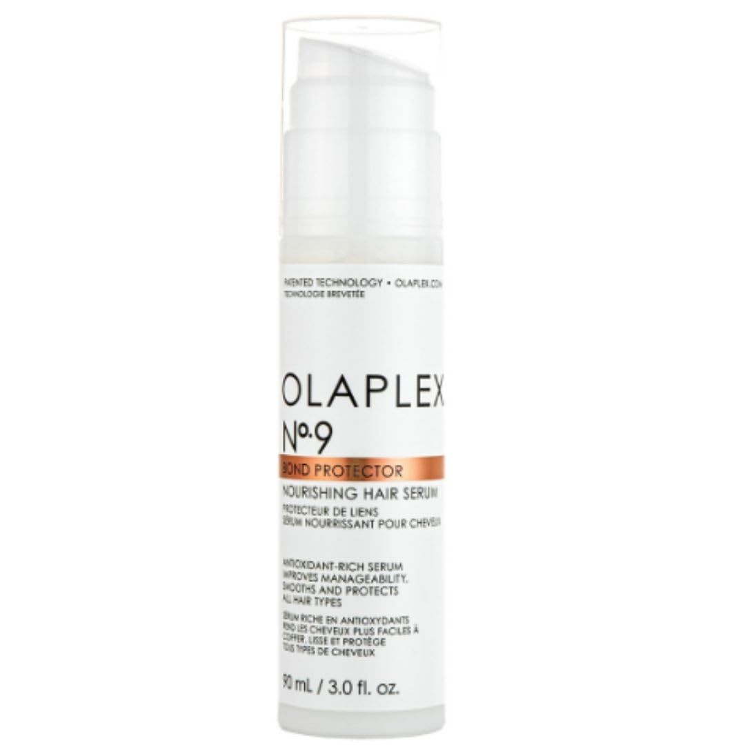 Flacon blanc Olaplex No.9 Bond Protector avec pompe. Inscription : Nourishing Hair Serum. Bande marron avec nom du produit.