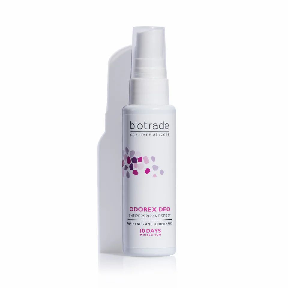 Wit spray met tekst. Opschrift: Odorex Deo. Schaduw op witte achtergrond.
