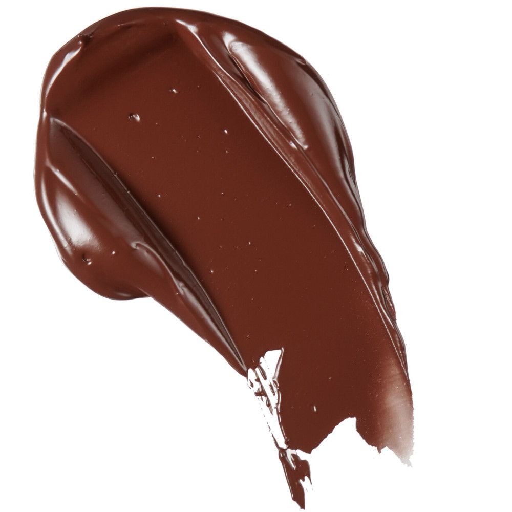 Échantillon de correcteur brun. Texture lisse. Fond blanc.