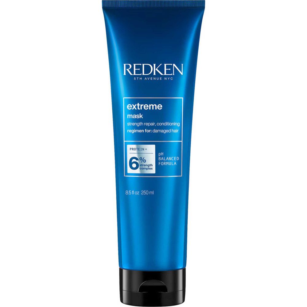 Tube bleu avec nom et texte du produit. Texte: strength repair, conditioning regimen for damaged hair. 8.5 fl oz 250ml.