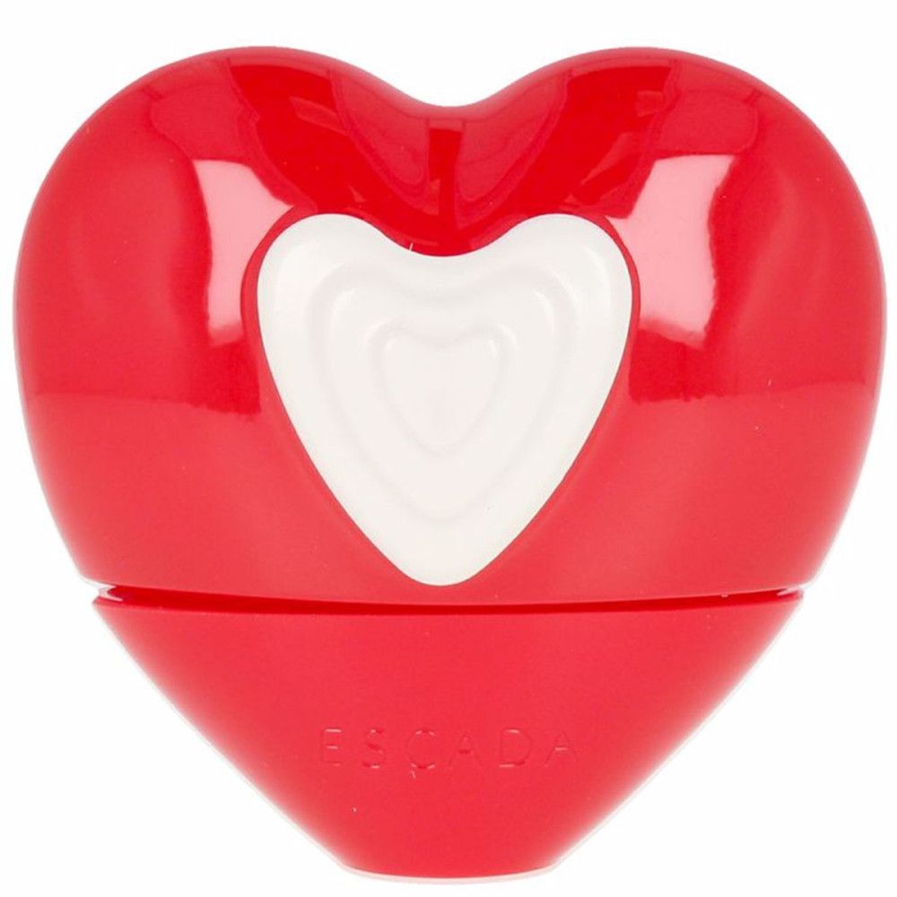 Flacon rouge en forme de cœur avec un cœur blanc. Le flacon a une forme de cœur et le lettrage ESCADA.
