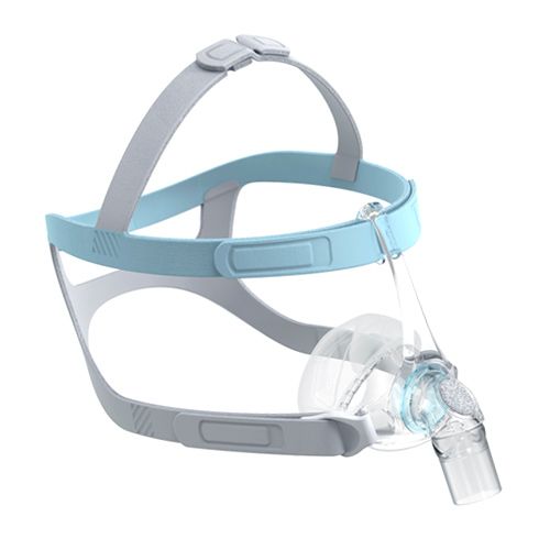 Masque nasal avec harnais bleu et corps transparent. Support gris. Vue en angle.