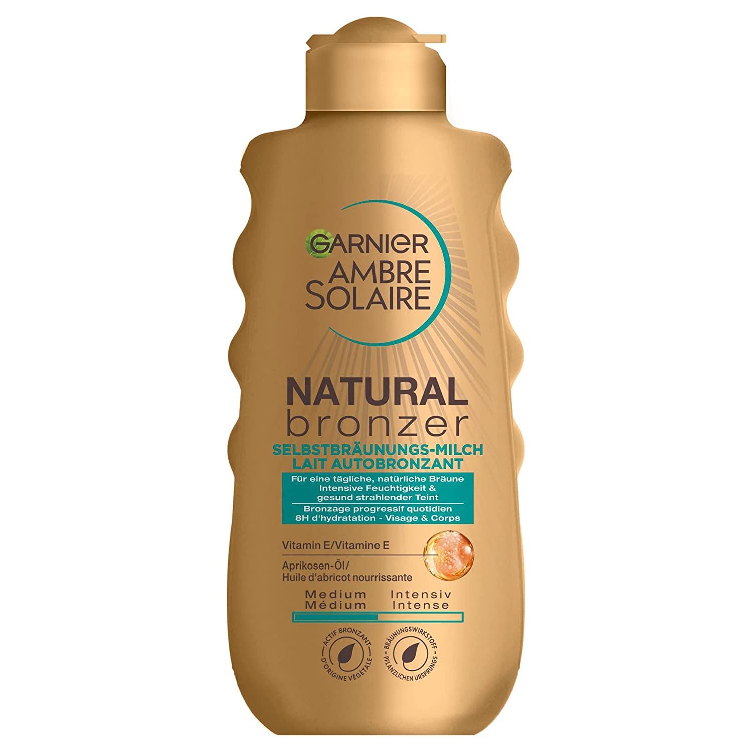 Flacon doré Garnier Ambre Solaire Natural Bronzer. Texte: Selbstbräunungs-Milch, Lait Autobronzant. Medium/Intense.
