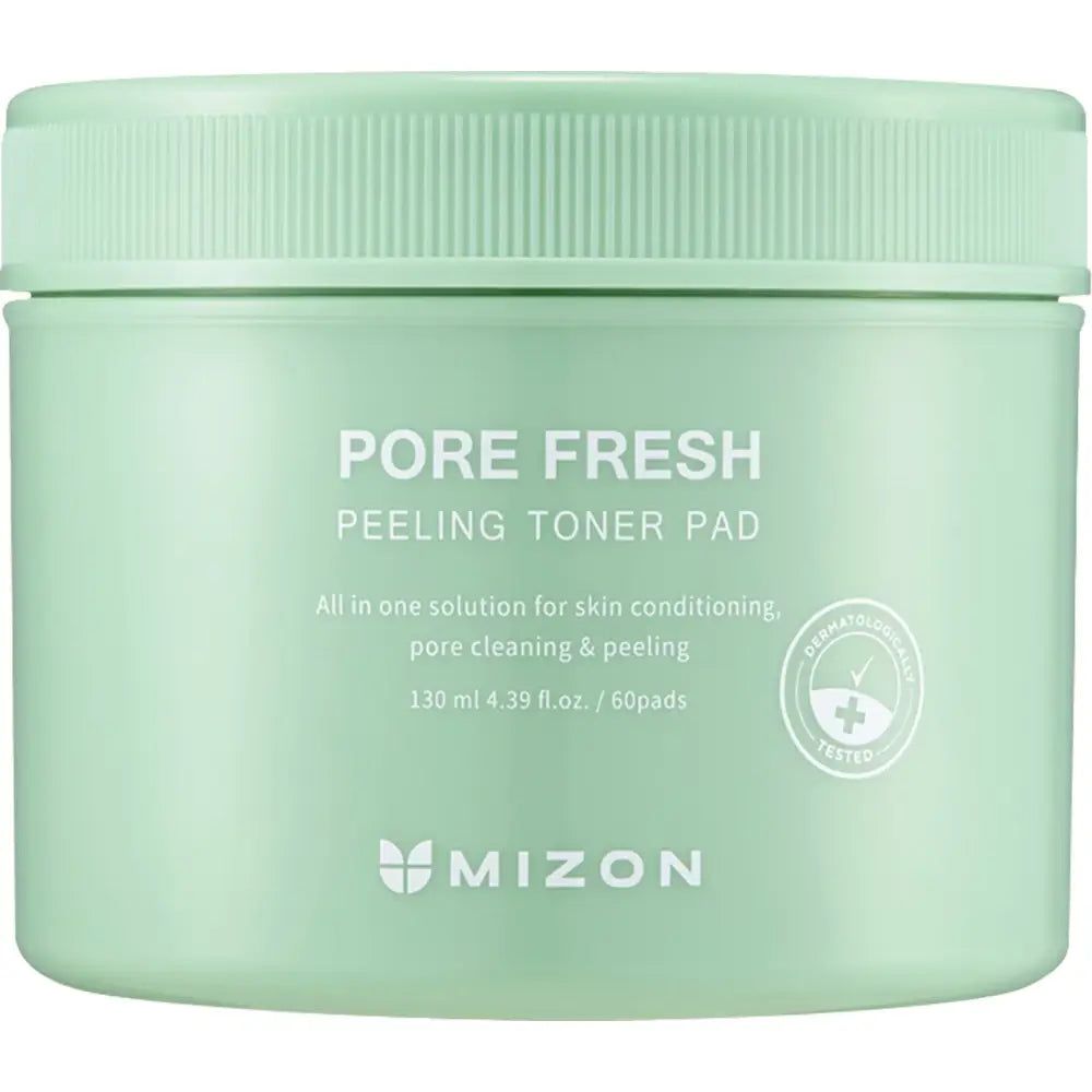 Boîte verte de tampons tonifiants. Inscription : Pore Fresh Peeling Toner Pad, 130 ml, 60 tampons. Marque : MIZON. Testé dermatologiquement.