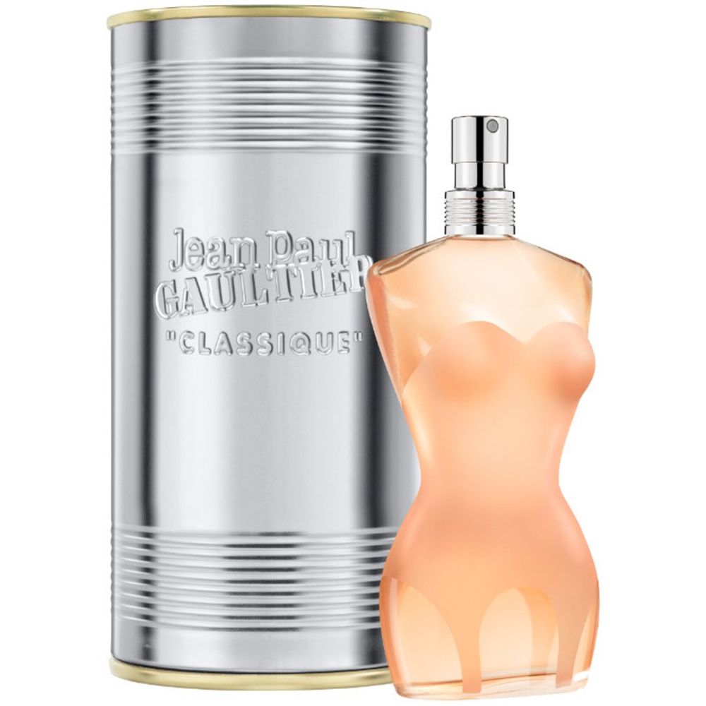 Flacon de parfum en forme de corps féminin et boîte. La boîte porte l'inscription "Jean Paul Gaultier CLASSIQUE".