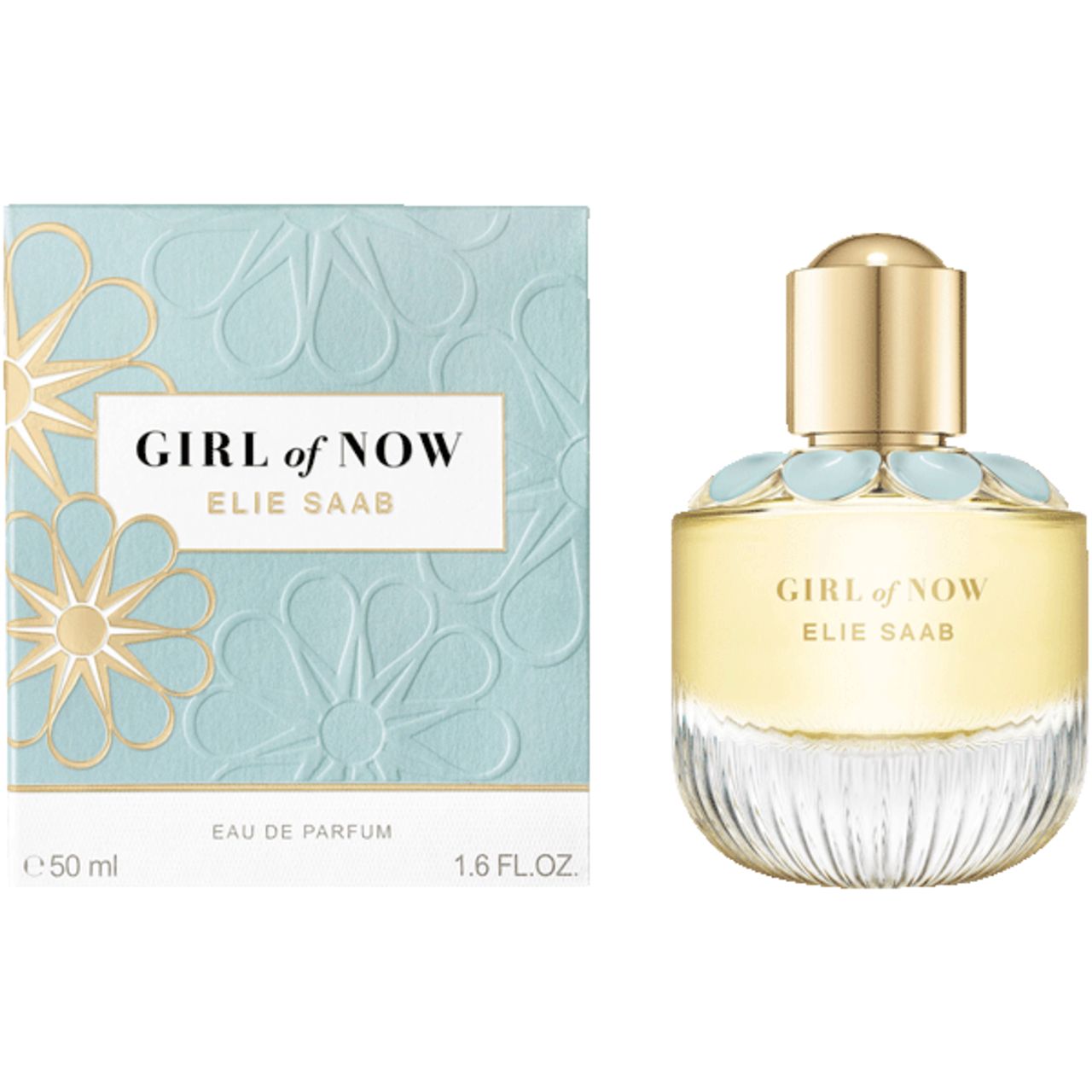 Gros plan sur la boîte. Inscription : GIRL of NOW, ELIE SAAB. Motif floral et texte.