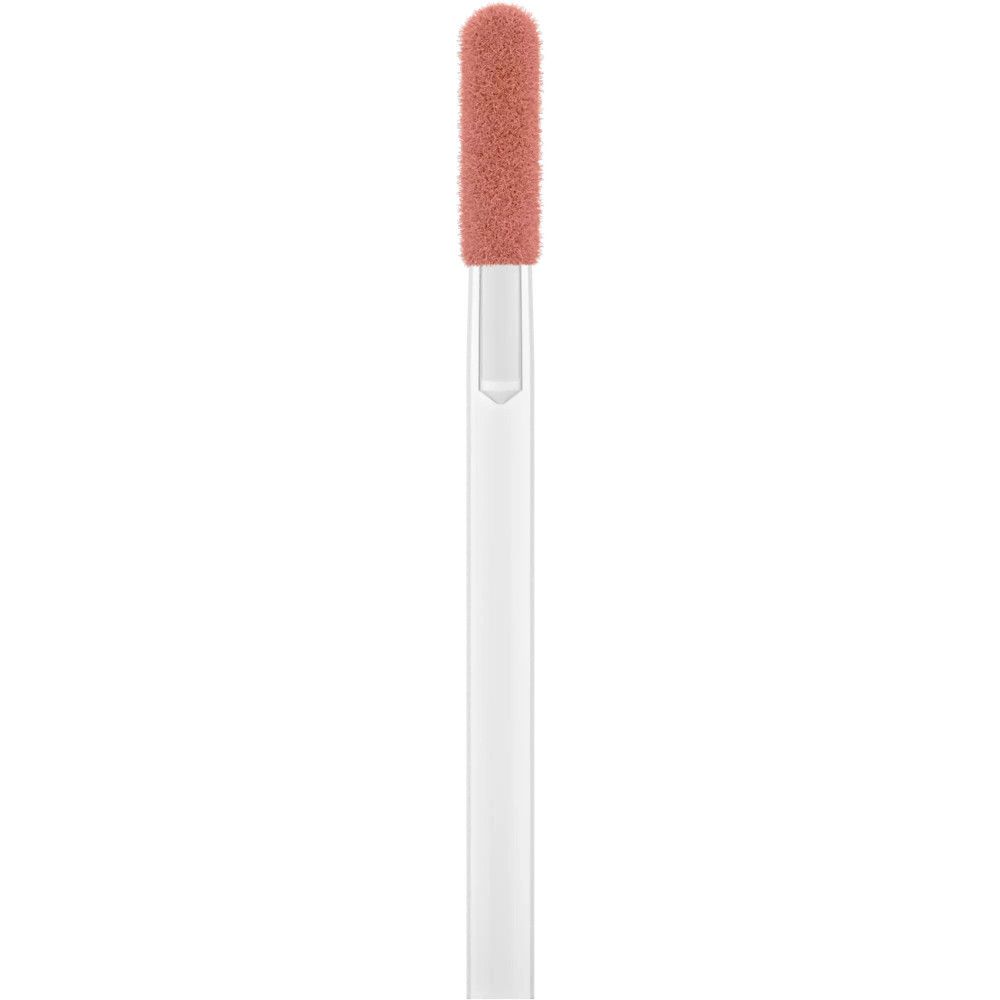 Applicateur du Catrice Shine Bomb Lip Lacquer. Embout applicateur rose sur une tige blanche. Pour l'application du rouge à lèvres.