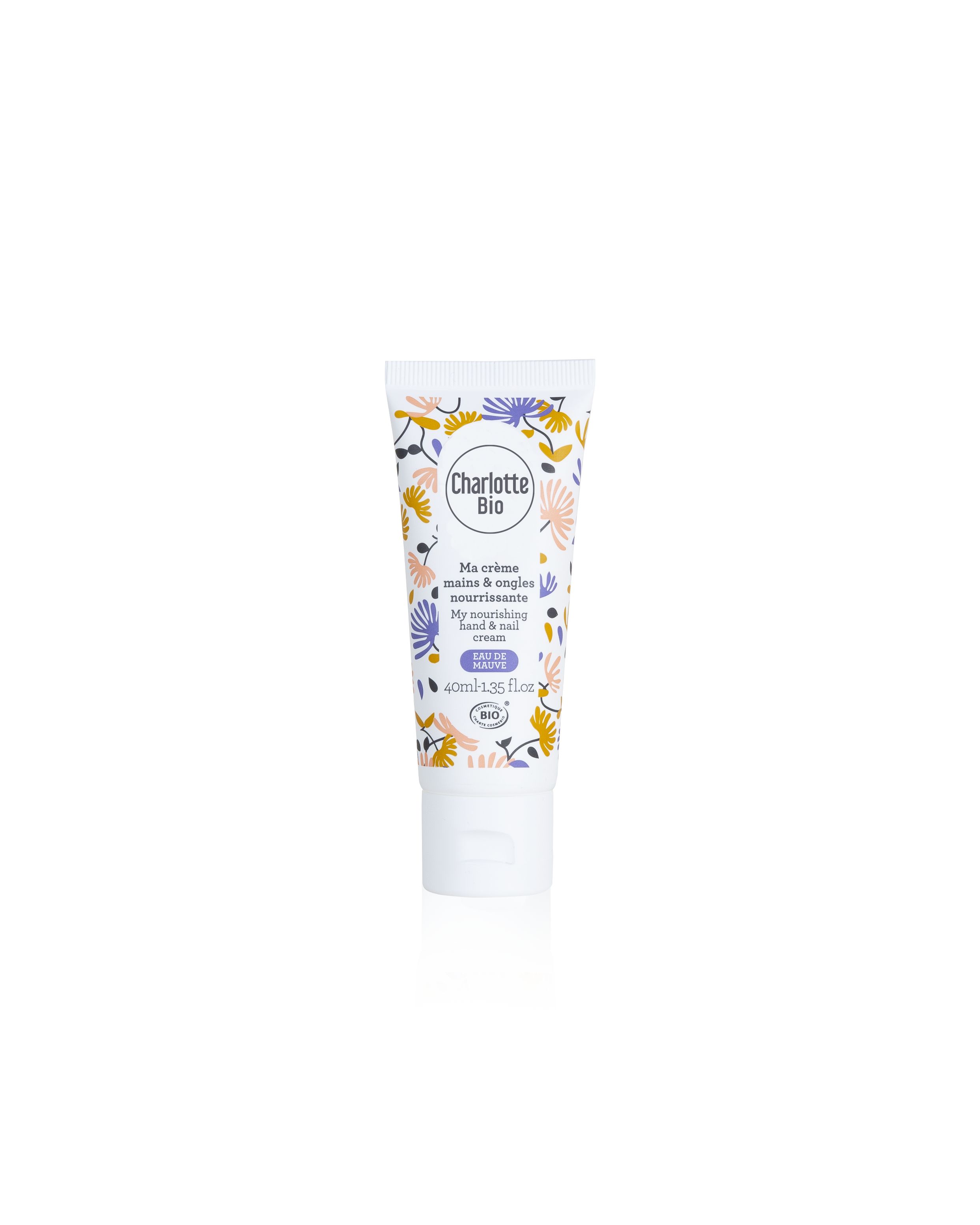 Crèmetube met bloemenpatroon. Opschrift: Charlotte Bio. Tekst: Ma crème mains & ongles nourrissante. BIO-certificering.