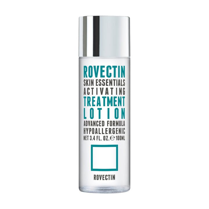 Cilindrische fles met zilveren dop. Opschrift: ROVECTIN Skin Essentials Activating Treatment Lotion. Hypoallergeen.
