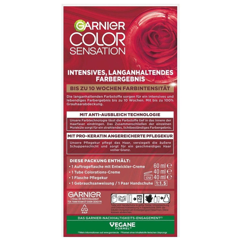 Garnier Color Sensation verpakking. Bevat: applicatorfles, kleuringcrème, gebruiksaanwijzing, handschoenen. Tekst met inhoudsinformatie.