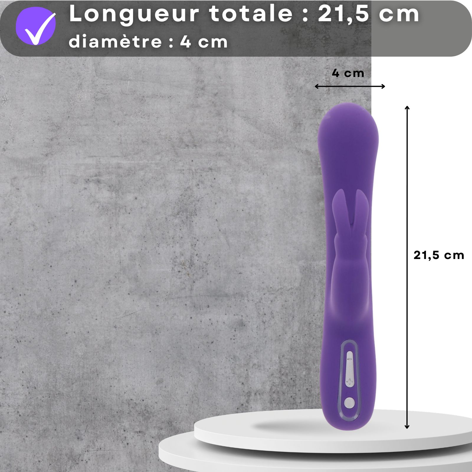 Vibrateur violet. 21,5 cm, diamètre 4 cm. Sur socle. Fond gris.