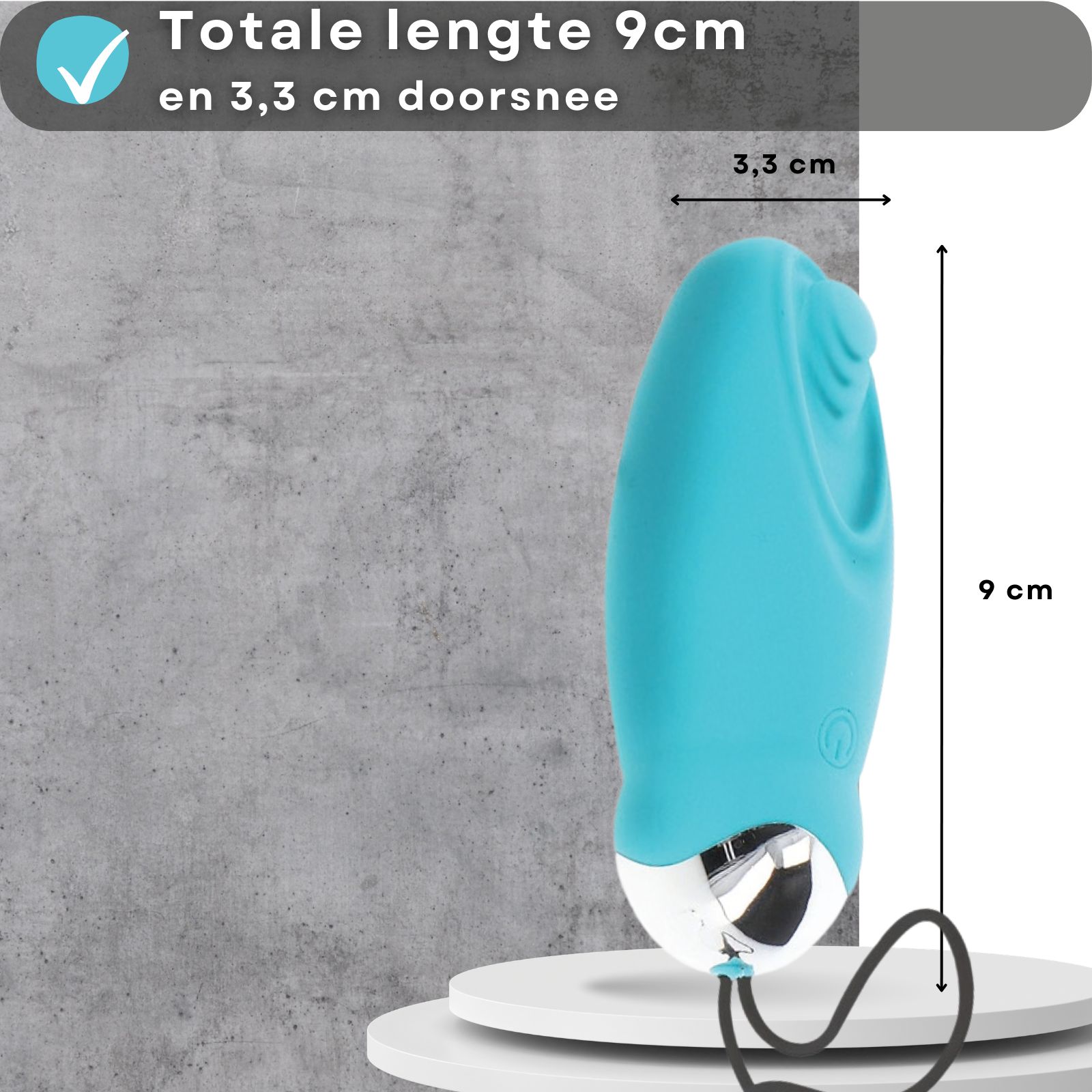 Blauw vibratie-ei, 9cm lang, 3,3cm diameter. Op voetstuk. Achtergrond: grijs.