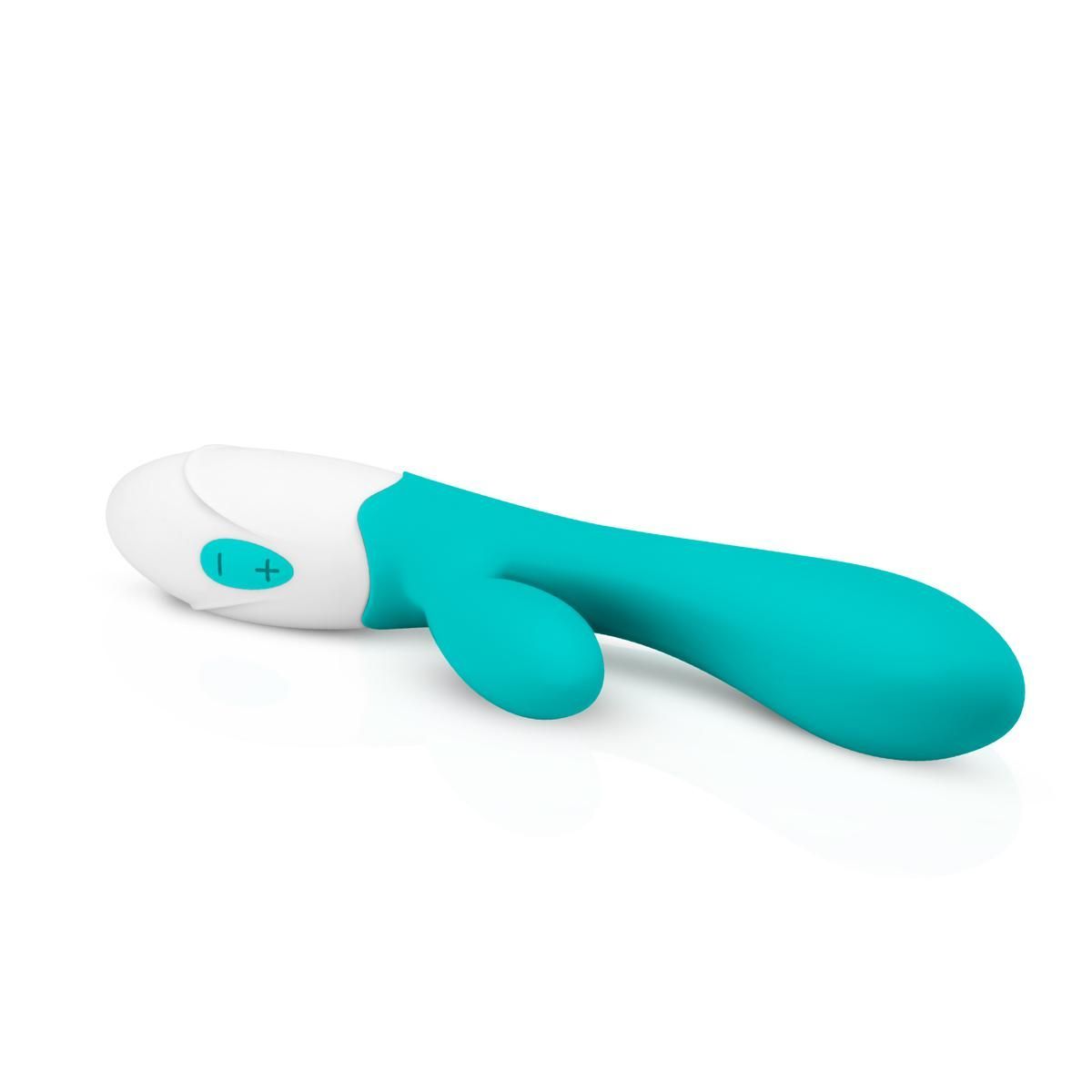 Turquoise-witte vibrator. Gebogen vorm met twee uitsteeksels. Bedieningspaneel met knoppen.