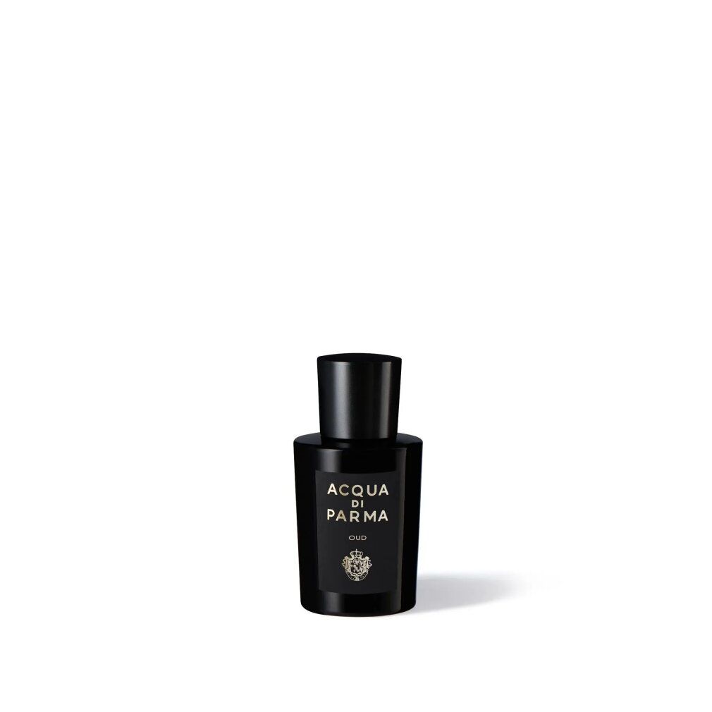 Flacon noir avec inscription ACQUA DI PARMA OUD. Bouchon noir. Écriture dorée.
