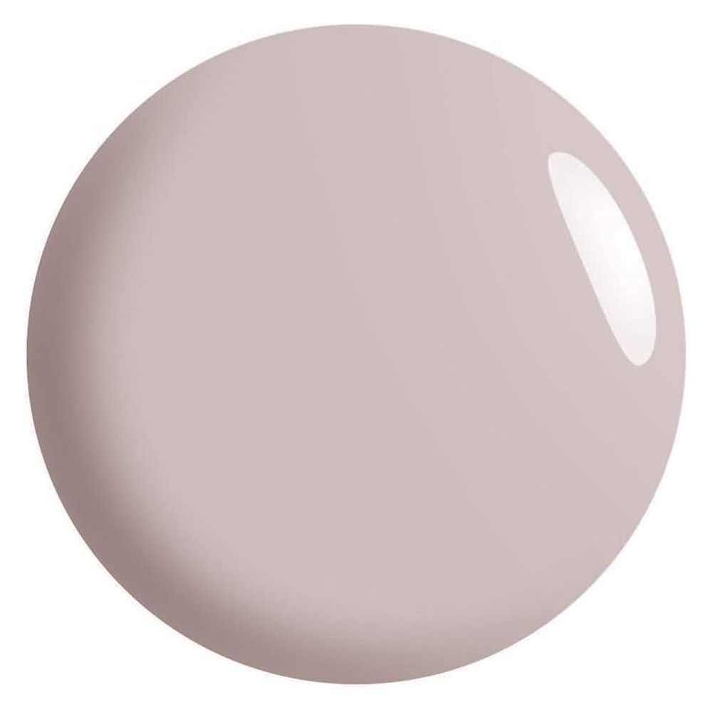 Tache ronde de vernis à ongles lilas clair. Surface brillante avec reflet clair.