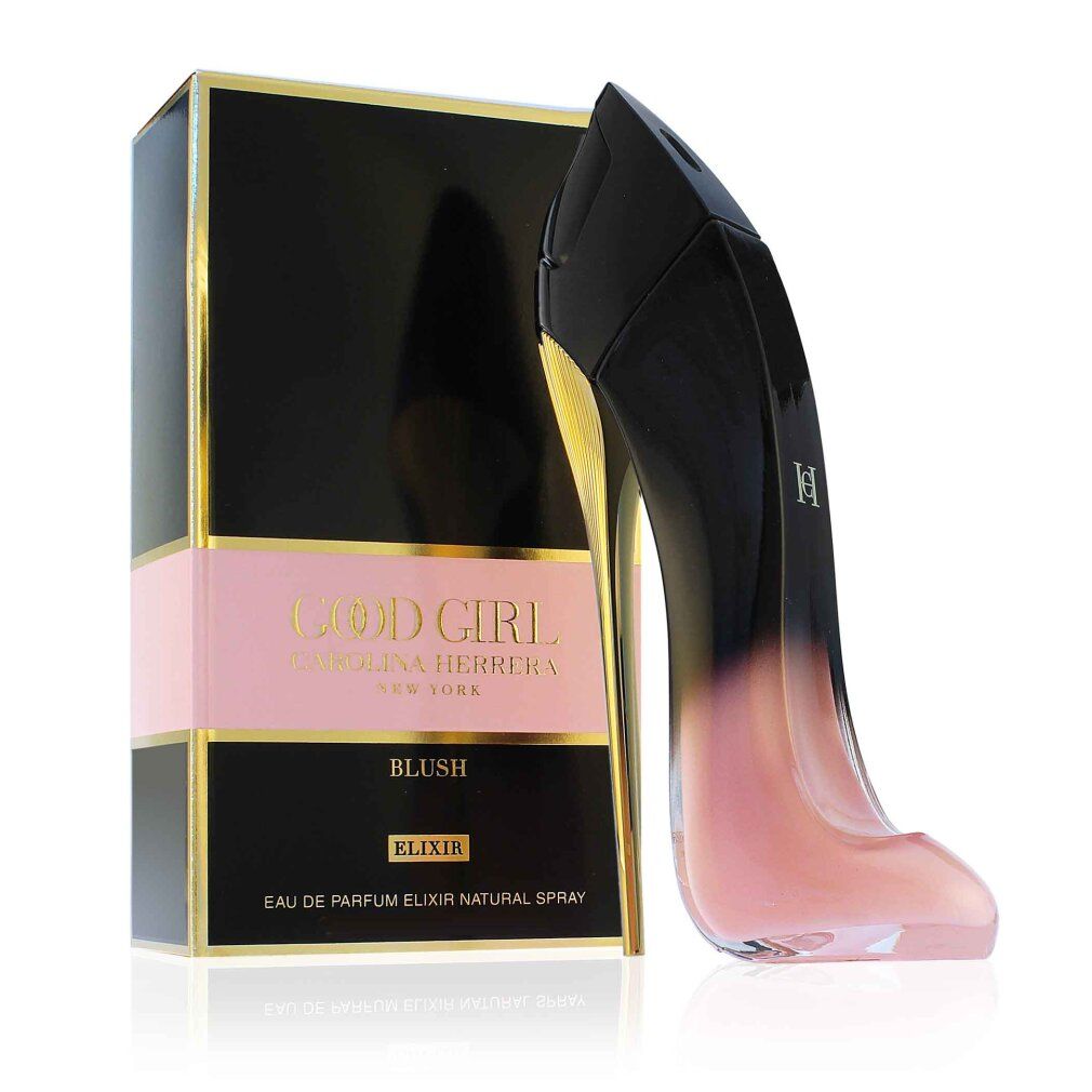 Flacon de parfum en forme d'escarpin noir et rose, à côté d'une boîte noire et or. Inscription: Good Girl Blush.