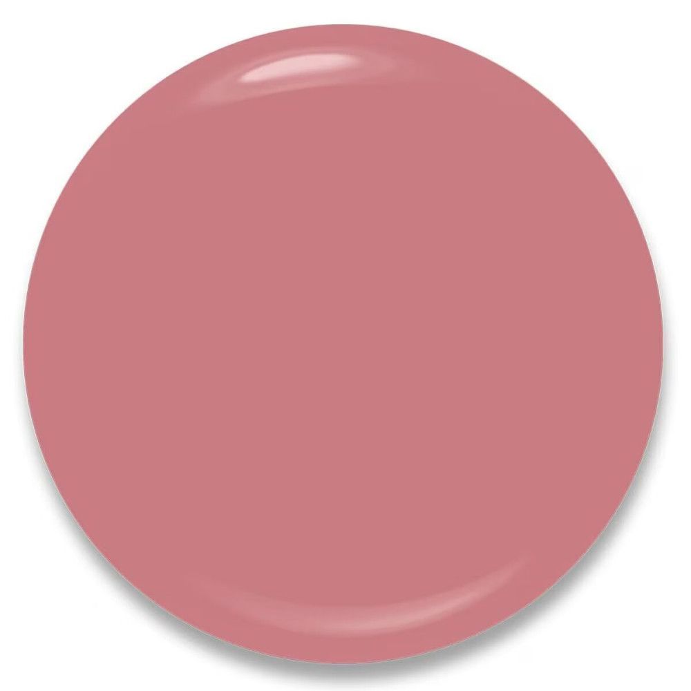 Tache ronde de vernis à ongles rose. Surface brillante. Ombre portée.