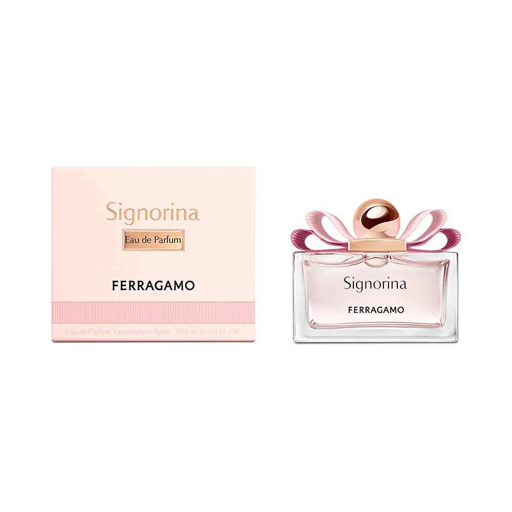 Signorina Eau de Parfum de Ferragamo. Flacon rectangulaire avec liquide rose, nœud rose et bouchon doré. Emballage rose.