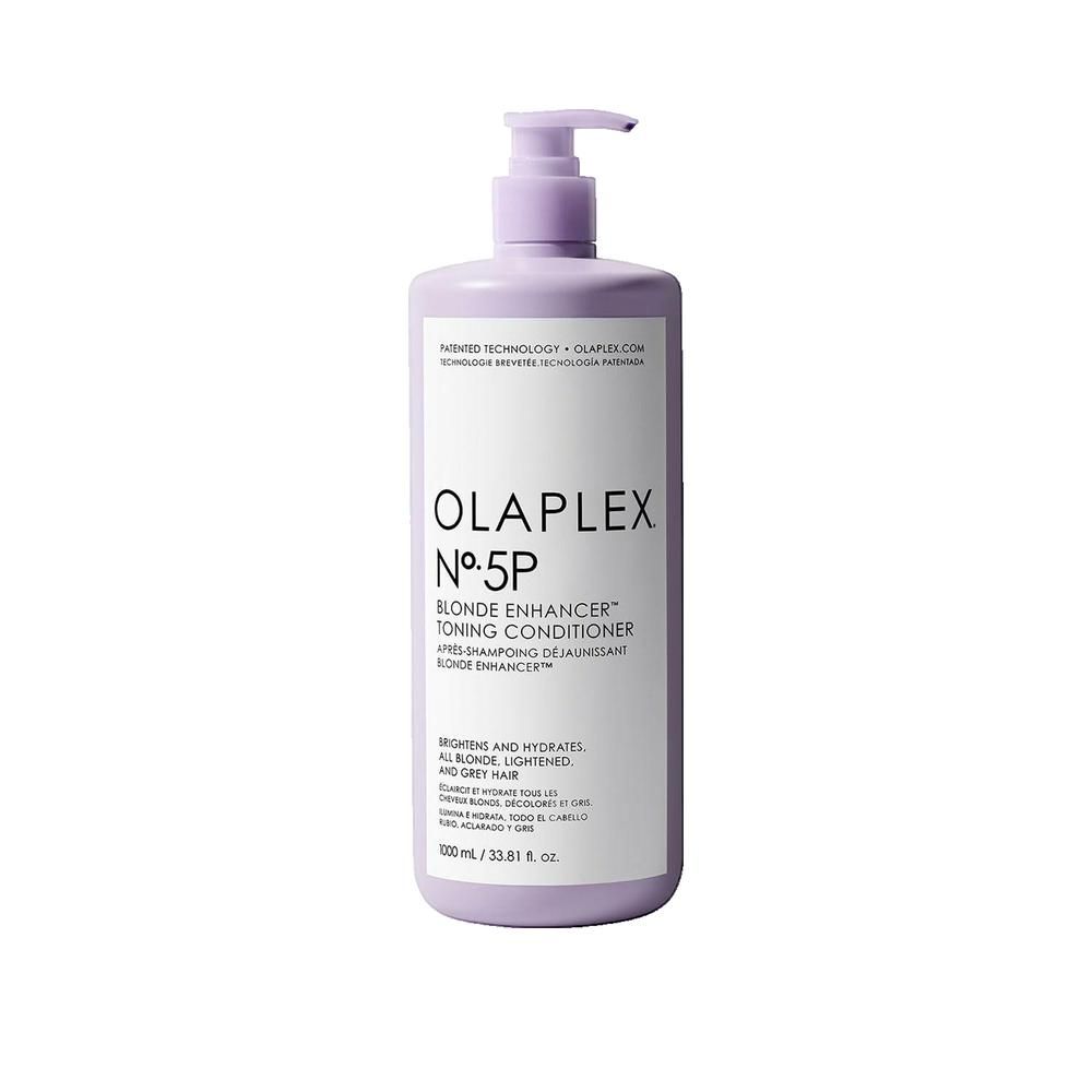 Flacon violet Olaplex N°5P avec pompe. Inscription: Blonde Enhancer Toning Conditioner. Pour cheveux blonds, décolorés et gris.
