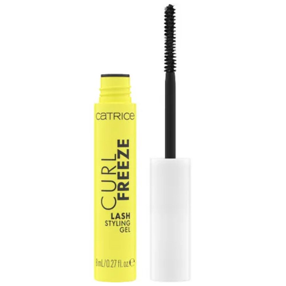 Gele gel tube met zwarte borstel. Tekst 'CURL FREEZE' en 'LASH STYLING GEL'. Zwarte borstel met witte handgreep. Cosmetisch product.