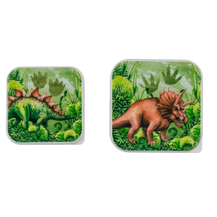 Twee vierkante brooddozen met dinosaurusmotieven. Eén toont een groene dinosaurus, de andere een bruine dinosaurus.