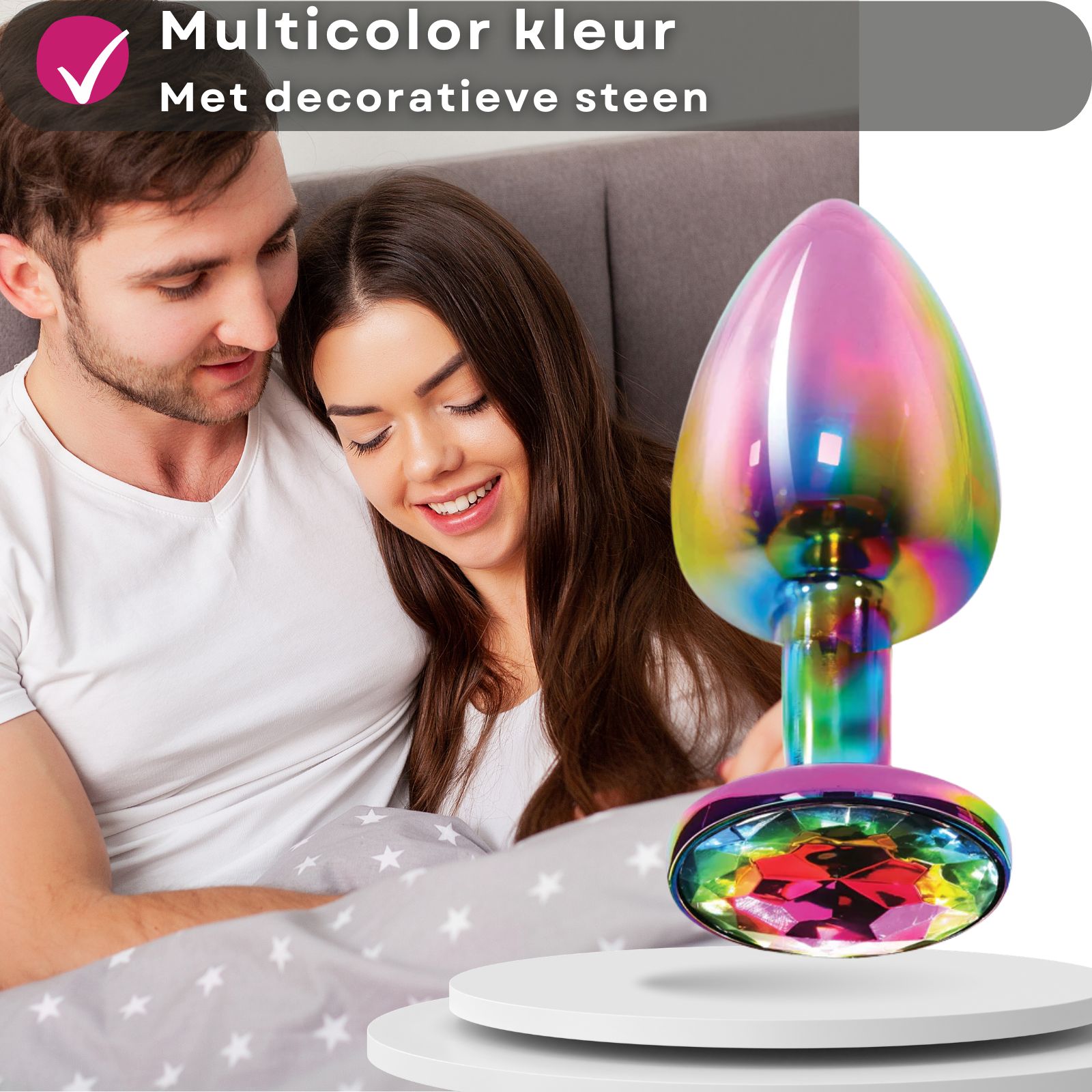 Multicolor anale plug met siersteen. Paar op de achtergrond. Kegelvormige kop, ronde basis met steen.