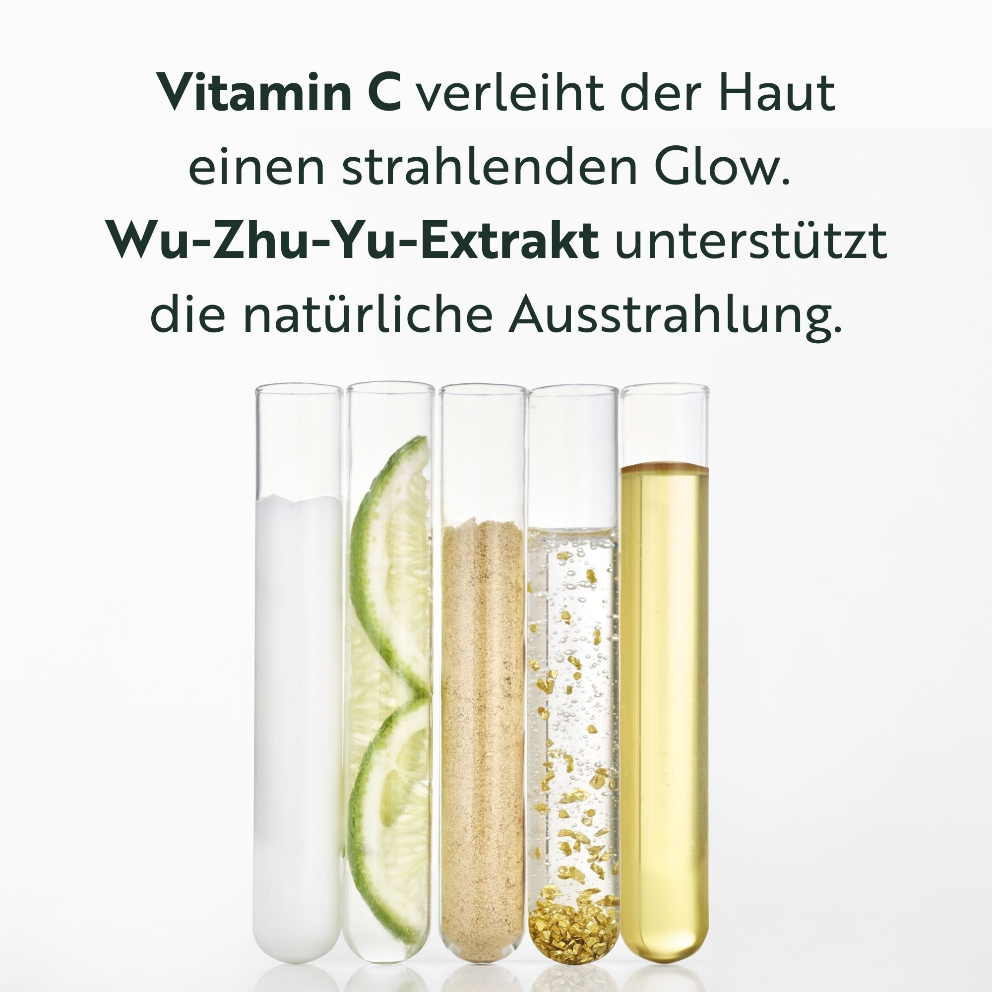 Tekst: Vitamine C geeft de huid een stralende gloed. Wu-Zhu-Yu-extract ondersteunt de natuurlijke uitstraling. 5 reageerbuizen met vloeistoffen.