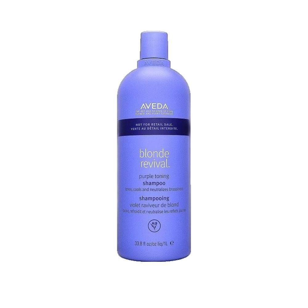 Fles Aveda Blonde Revival Shampoo. Paarse fles met witte tekst. Bevat productnaam en tekst in het Engels en Frans.