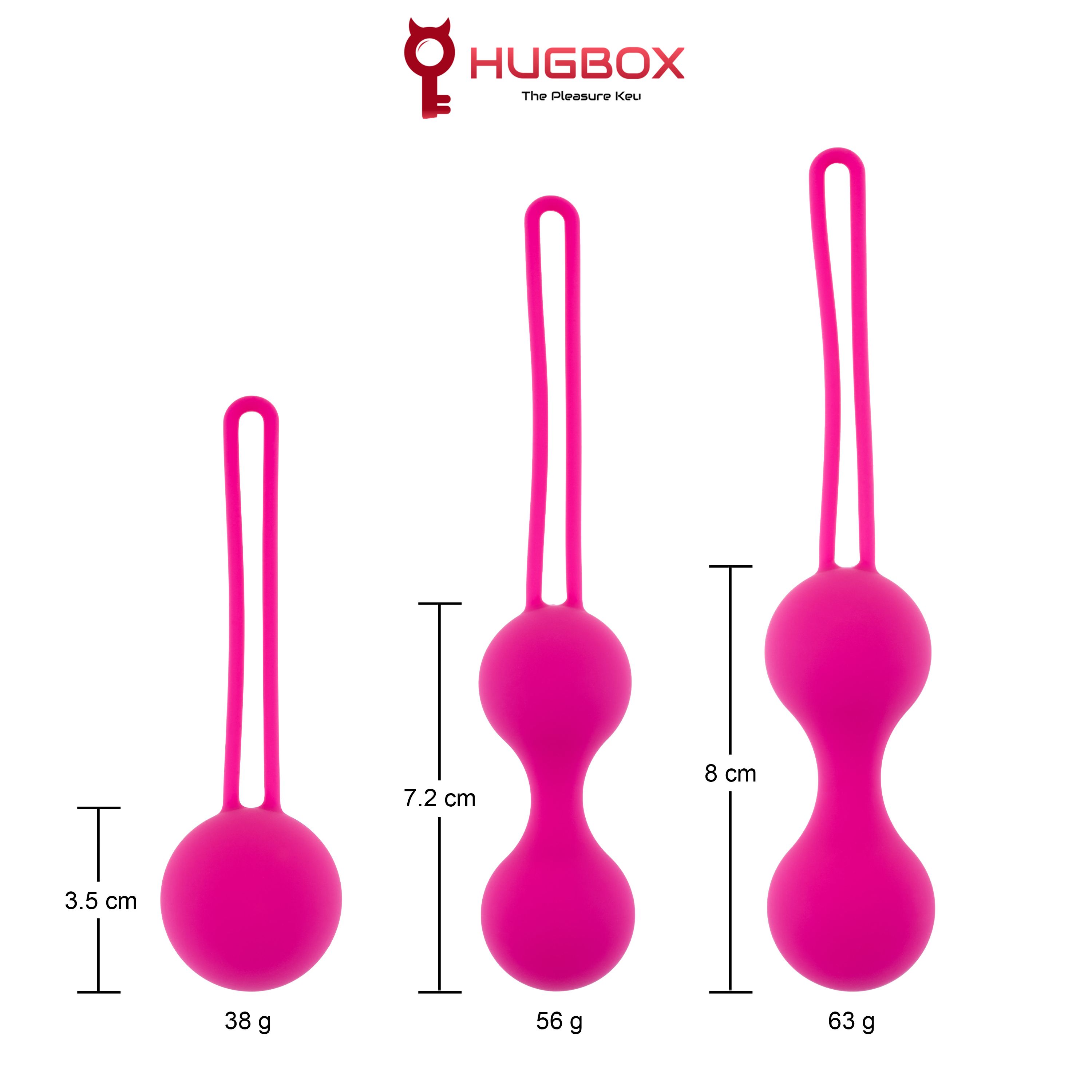 Trois boules roses avec boucles. Dimensions : 3,5 cm, 7,2 cm et 8 cm. Poids : 38 g, 56 g et 63 g. Logo HUGBOX.