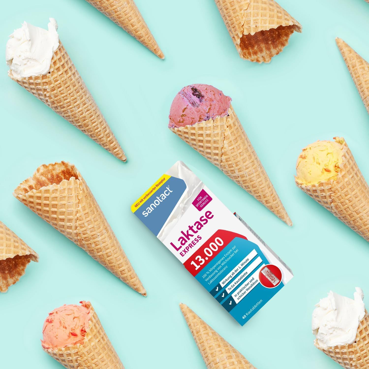 Verpakking sanotact Laktase 13.000 EXPRESS tussen ijshoorntjes op blauwe achtergrond. Productinformatie duidelijk zichtbaar.